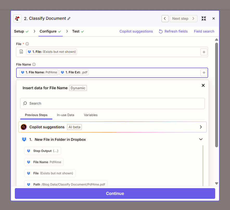 Panel de configuración de la acción Clasificar documento de Zapier que muestra el archivo asignado desde el activador y el nombre del archivo construido a partir del nombre del archivo más la extensión del archivo.